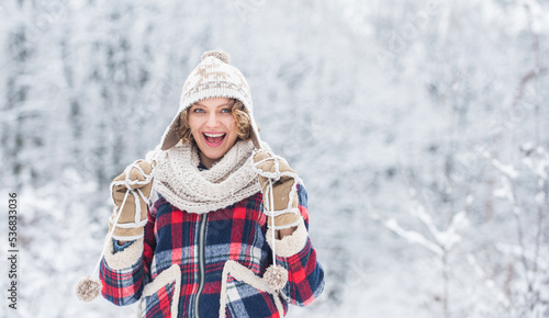 Enjoy every snowflake. Cheerful emotional girl having fun outdoors. Winter outfit. Woman wear warm accessories stand in snowy nature. Winter fashion collection. Winter admirer. Favorite season © be free