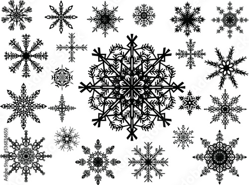 small and large black snowflakes collection on white