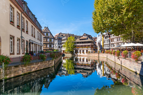 Picturesque half timbered buildings and the Maison des Tanneurs (tanners house) in the Petite France canal zone along the Ill river in the historic city of Strasbourg, in the Alsace region of France. 
