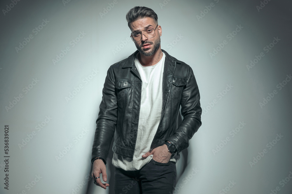 sexy casual man putting one hand in pocket sexy casual man putting one hand in pocket