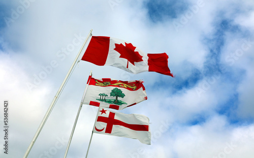 Flag of Canada, Prince Edward Island and Mi'kmaq people in Lennox Island is an island located in Malpeque Bay off the northwest coast of Prince Edward Island, Canada. photo
