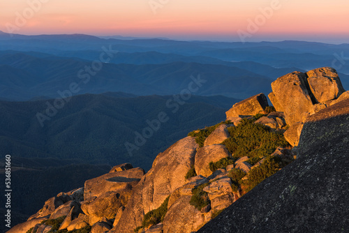 Obraz na plátne First light hits the side of Mount Buffalo in Victoria's high country