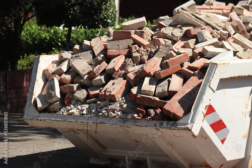 Garbage Dumpster near a construction site