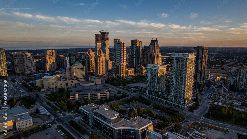 Drone shot of a cityscape view at sunset