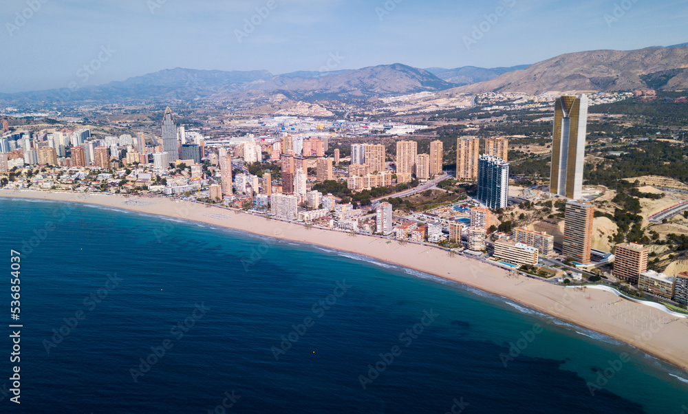 Panoramic aerial view of coast line at Benidorm with view of buildings and sea, Spain