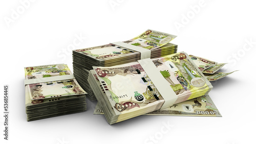 3D rendering of stacks of Iraqi dinar notes isolated on white background