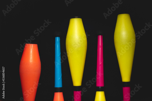 Clubs are one of the three most popular props used by jugglers, A typical club is in the range of 50 centimetres  long, weighs between 200 and 300 grams