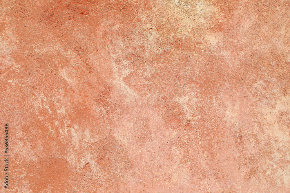 Weathered red stucco wall texture