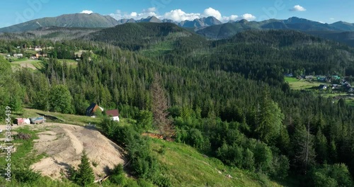 Aerial view of the Tatra Mountains. Drone flight over the Tatra Mountains with a view of the mountain peaks. High rocky mountains.