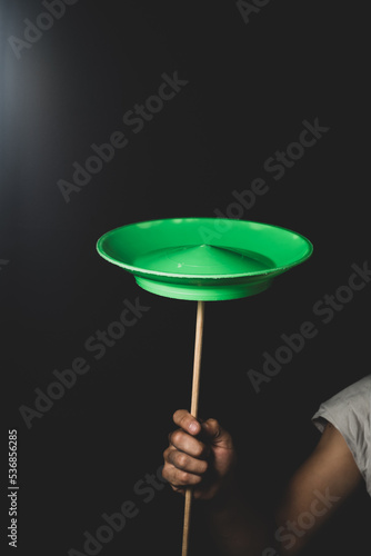 Chinese juggling dishes / spining plates