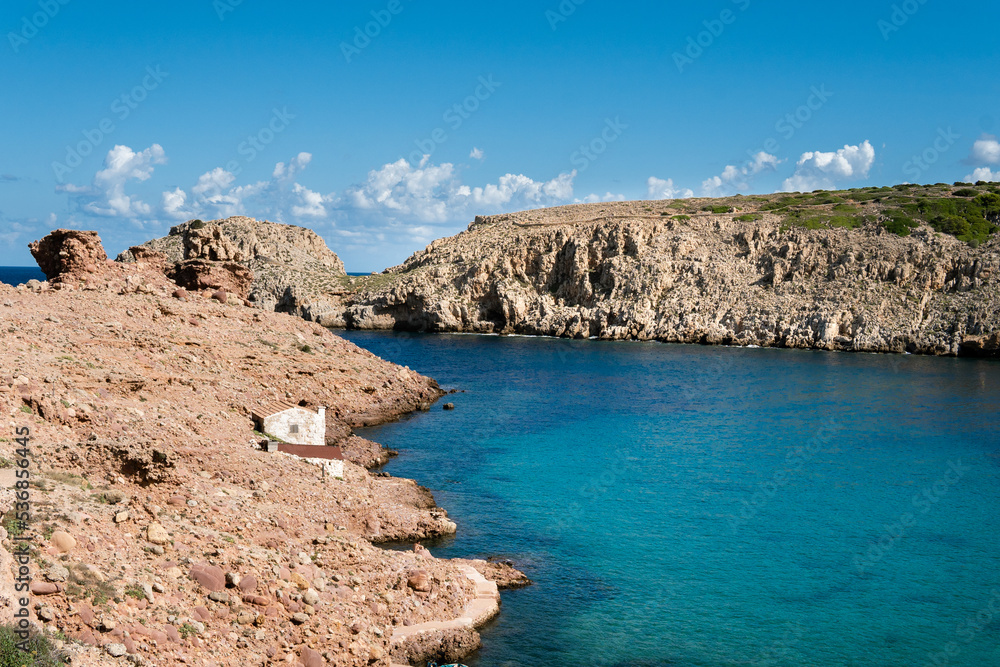 Cala Morell en isla de menorca mar mediterraneo con mar azul