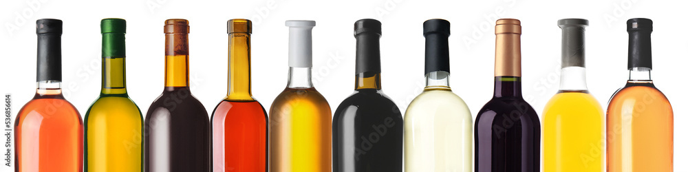 Set of bottles with different kinds of wine on white background Set of bottles with different kinds of wine on white background