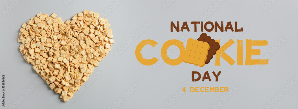 Heart made of tasty crackers and text NATIONAL COOKIE DAY on light background Heart made of tasty crackers and text NATIONAL COOKIE DAY on light background