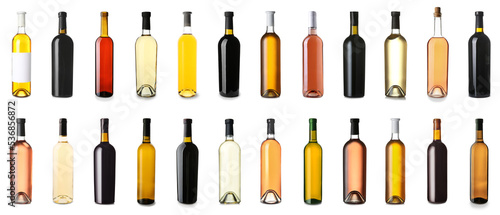Set of bottles with different kinds of wine on white background