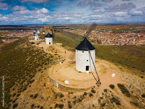 Aerial view of Wind mills at knolls at Consuegra, Toledo region, Spain photo