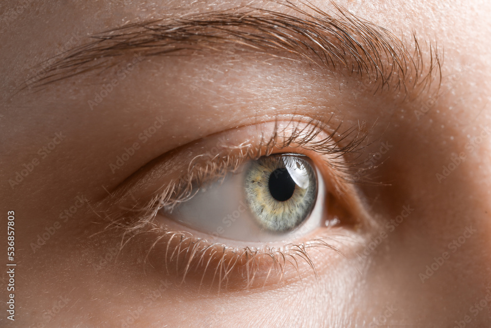 Young woman with beautiful eyes, closeup Young woman with beautiful eyes, closeup