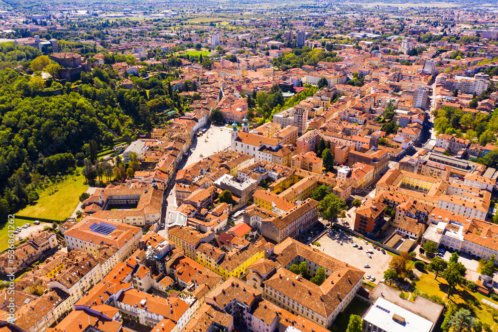 Picturesque aerial view of old part of Gorizia with medieval fortified castle on hilltop, Italy..