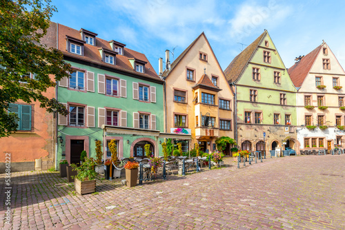 Picturesque half timber buildings housing shops, cafes and homes in the historical town of Kaysersberg-Vignoble, France, in the Alsace region.
