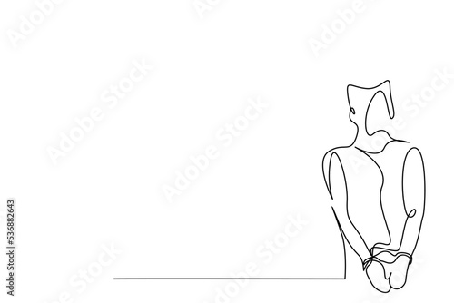 a criminal man in handcuffs is standing