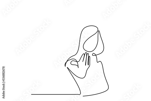 a young beautiful woman is making a come sign with her hands