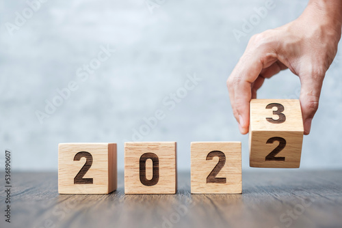 hand flip 2022 to 2023 block. goal, Resolution, strategy, plan,, motivation, reboot, forecast, change, countdown and New Year holiday concepts