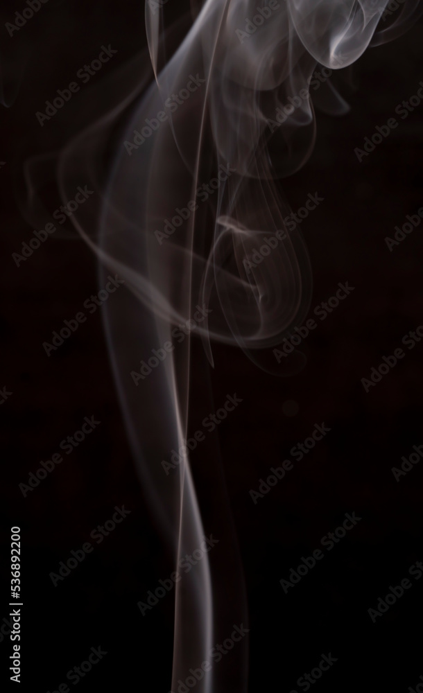 Smoke on a black background. Abstract background. Smoke on a black background. Abstract background.