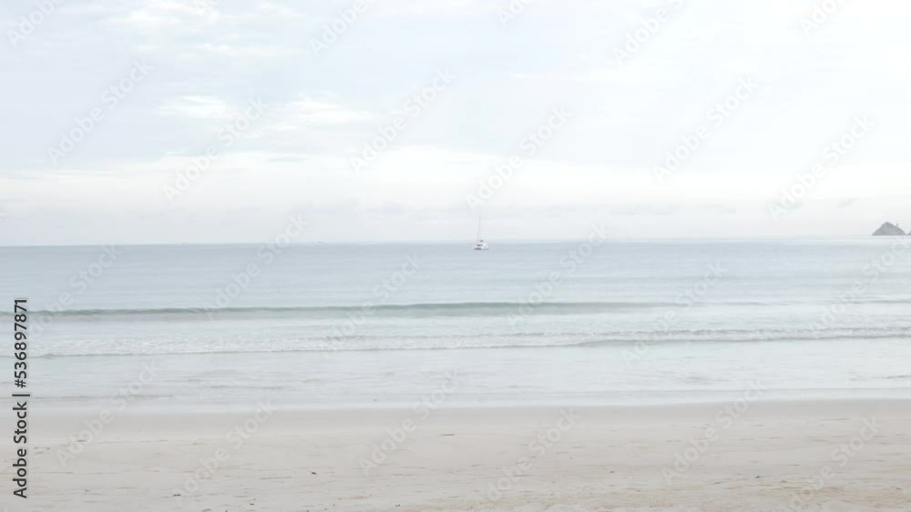 white sand beach with green blue color sea in summer vacation holiday time in Phuket,Thailand in early morning white sand beach with green blue color sea in summer vacation holiday time in Phuket,Thailand in early morning