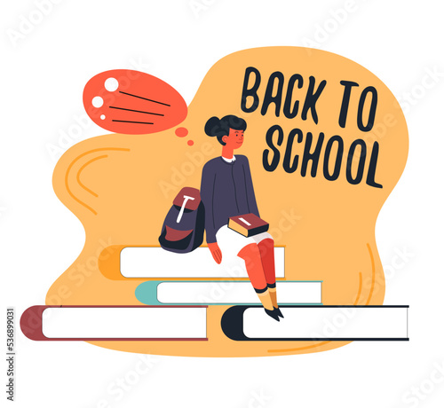 Back to school, girl sitting on books female pupil