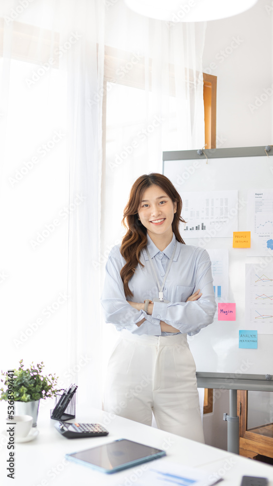 Office worker with a beautiful Asian woman in a private office, Daily routine of office workers, Welcome to work in the morning with a bright smile, Businesswoman in office concept. Office worker with a beautiful Asian woman in a private office, Daily routine of office workers, Welcome to work in the morning with a bright smile, Businesswoman in office concept.