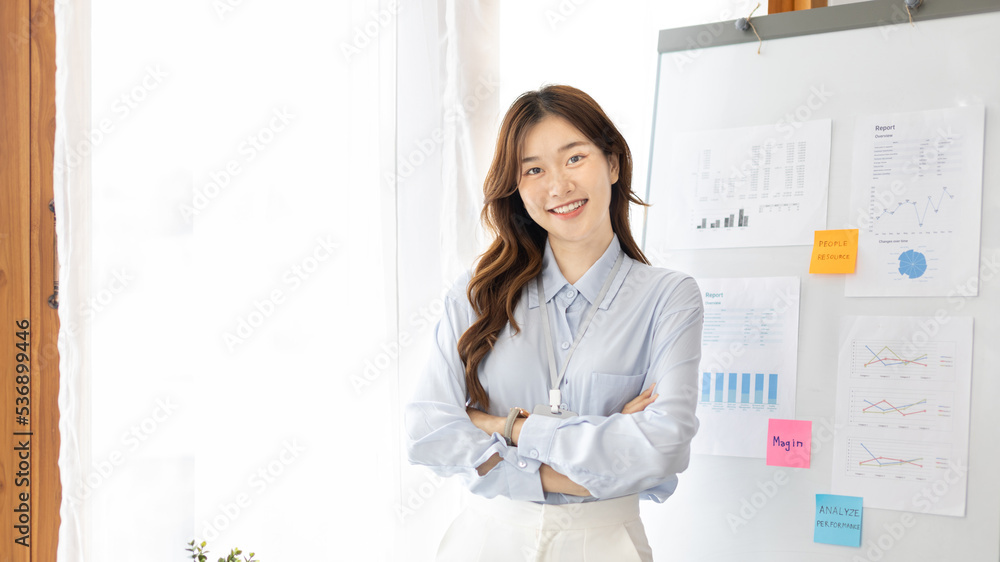 Office worker with a beautiful Asian woman in a private office, Daily routine of office workers, Welcome to work in the morning with a bright smile, Businesswoman in office concept.