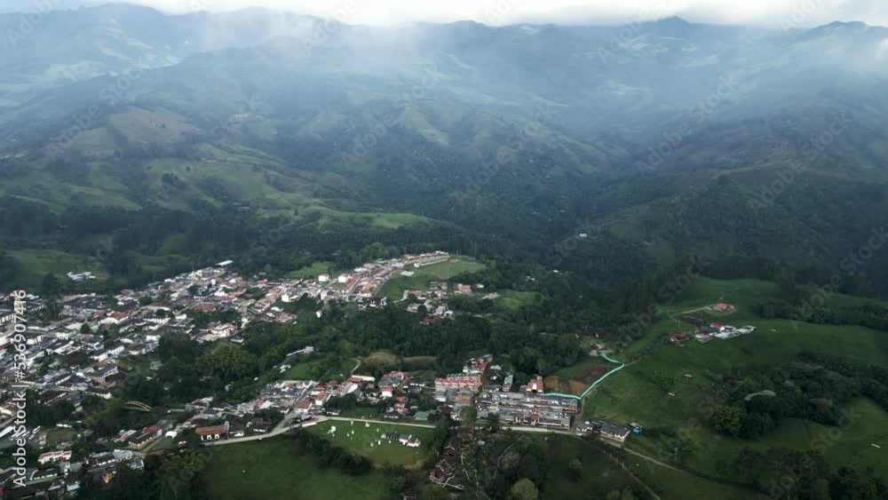 Salento Town in Bogota Colombia, Aerial Drone Panning Above Colonial City Hiking Tourism Destination, Cocora Valley and Coffee Plantations near the Cloud Forest Salento Town in Bogota Colombia, Aerial Drone Panning Above Colonial City Hiking Tourism Destination, Cocora Valley and Coffee Plantations near the Cloud Forest