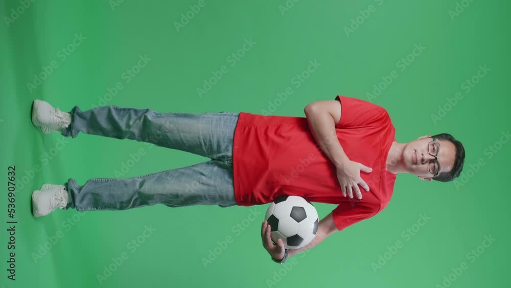 Full Body Of Asian Man With A Ball Putting Hand On His Heart To Respect The National Flag And Anthem While Cheering Soccer On Green Screen Background
Full Body Of Asian Man With A Ball Putting Hand On His Heart To Respect The National Flag And Anthem While Cheering Soccer On Green Screen Background