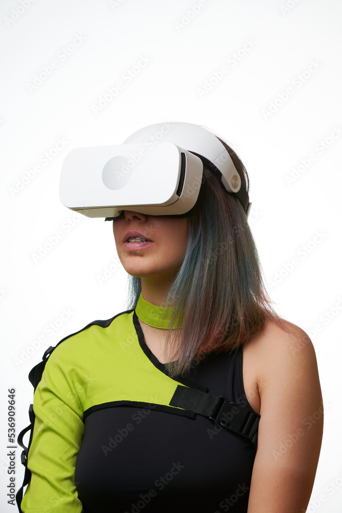 Woman is using virtual reality headset. Concept of virtual, augmented and extended reality and metaverse. Woman is using virtual reality headset. Concept of virtual, augmented and extended reality and metaverse.