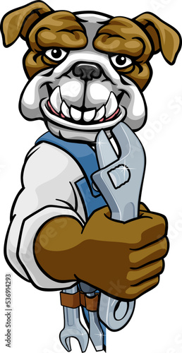 A bulldog cartoon animal mascot plumber, mechanic or handyman builder construction maintenance contractor peeking around a sign holding a spanner or wrench