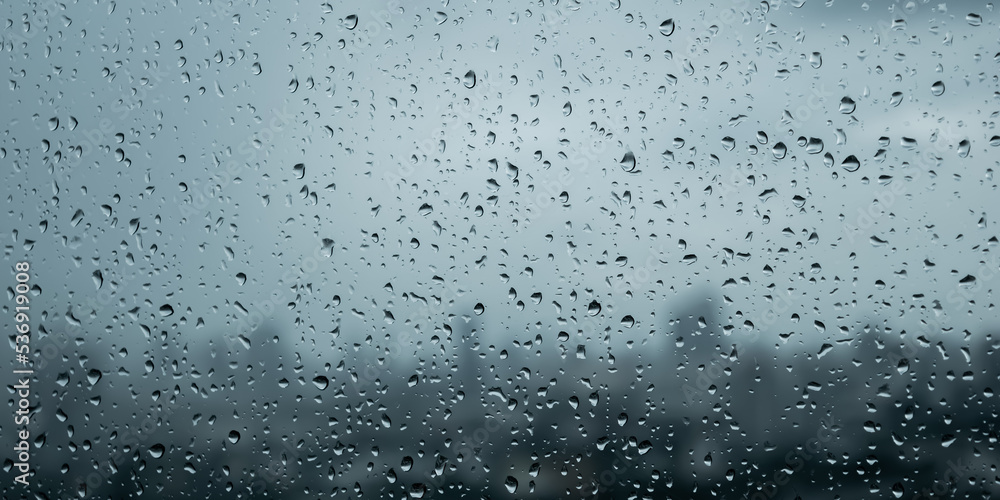 Water drops on glass, rain drop background texture Water drops on glass, rain drop background texture