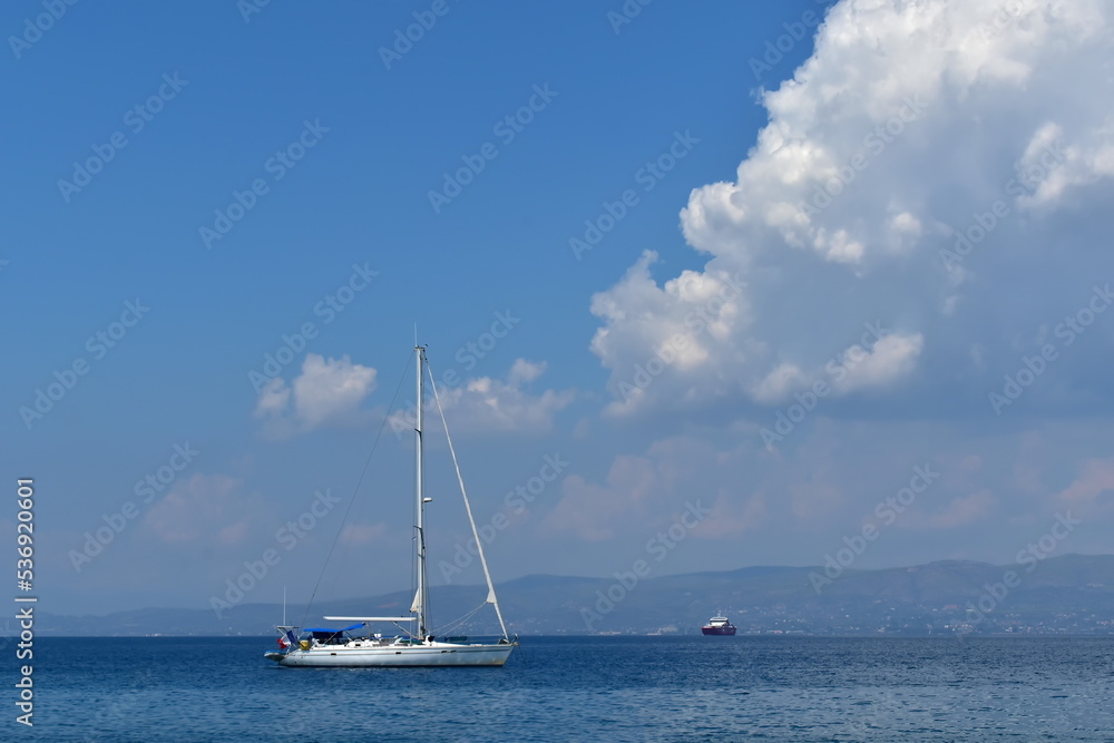 beautiful seascape with white yacht on a clear day