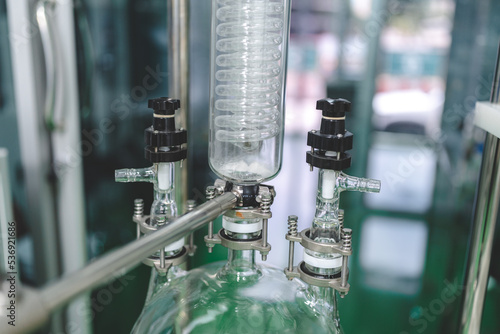 Cannabis ganja CBD oil scientific extraction machine, medicine factory technology for scientist worker in work of hemp plants process laboratory. chemical production equipment concept