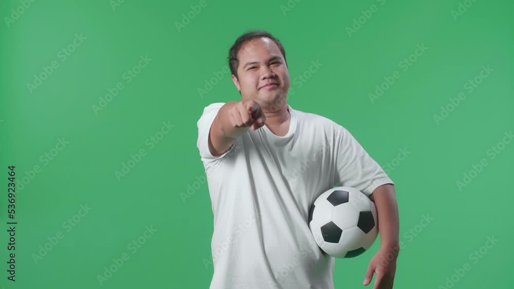 Asian Man With A Ball Putting Hand On His Chest And Pointing Forward While Cheering Soccer On Green Screen Background
Asian Man With A Ball Putting Hand On His Chest And Pointing Forward While Cheering Soccer On Green Screen Background