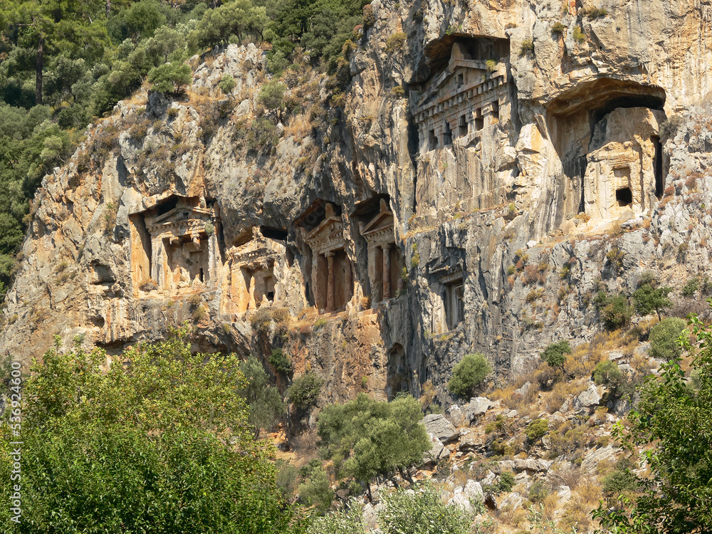 Lycian tombs carved into the rock. Cruise on the Dalyan River in Turkey to Istuzu Beach. Turkish Amazon