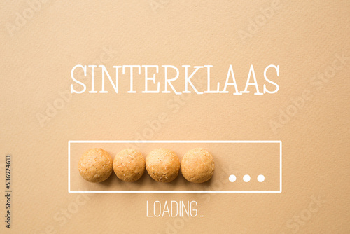 pepernoten or kruidnoten: sweet traditional dutch cookies for sinterklaas holiday - saint nicholas day. beige neutral holiday background
