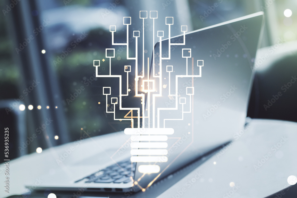 Creative light bulb with chip hologram on modern laptop background, artificial Intelligence and neural networks concept. Multiexposure Creative light bulb with chip hologram on modern laptop background, artificial Intelligence and neural networks concept. Multiexposure