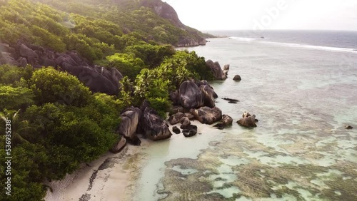 top view of the island with rocks, jungle, lagoon and sand. Vacation, honeymoon in the Seychelles photo