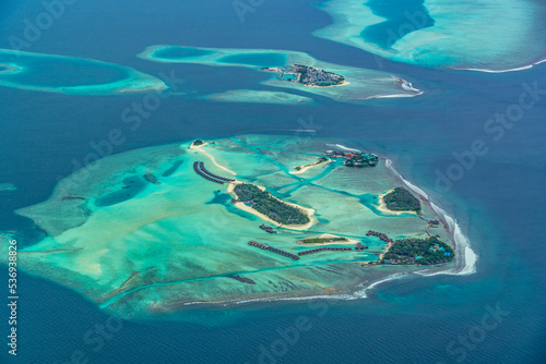 Aerial view of Dhigu, Bushi and Moyo Island, Maldives with the Anantara Maldives Resorts, Maldive Atoll - bird eyes view photo