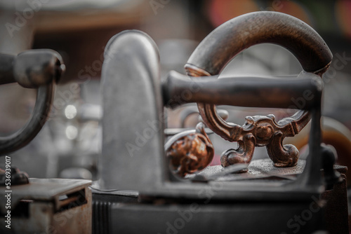 Old metal objects in a junk shop.



 photo