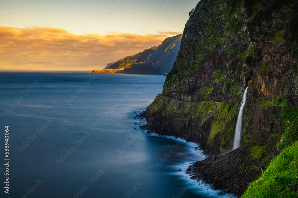 Sunset at a waterfall near Seixal village in the Madeira Islands, Portugal