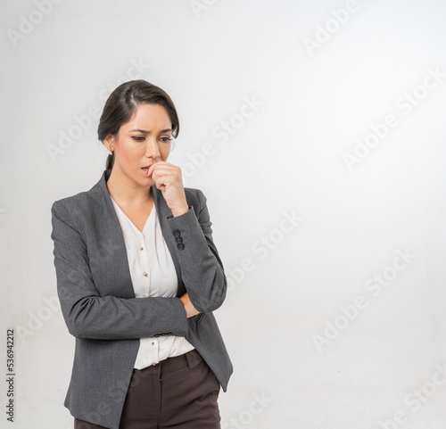 Studio portrait photo of a young beautiful elegant Brazilian female businesswoman lady wearing smart casual business attire suit posing with a series moments of emotion and gesture for all application