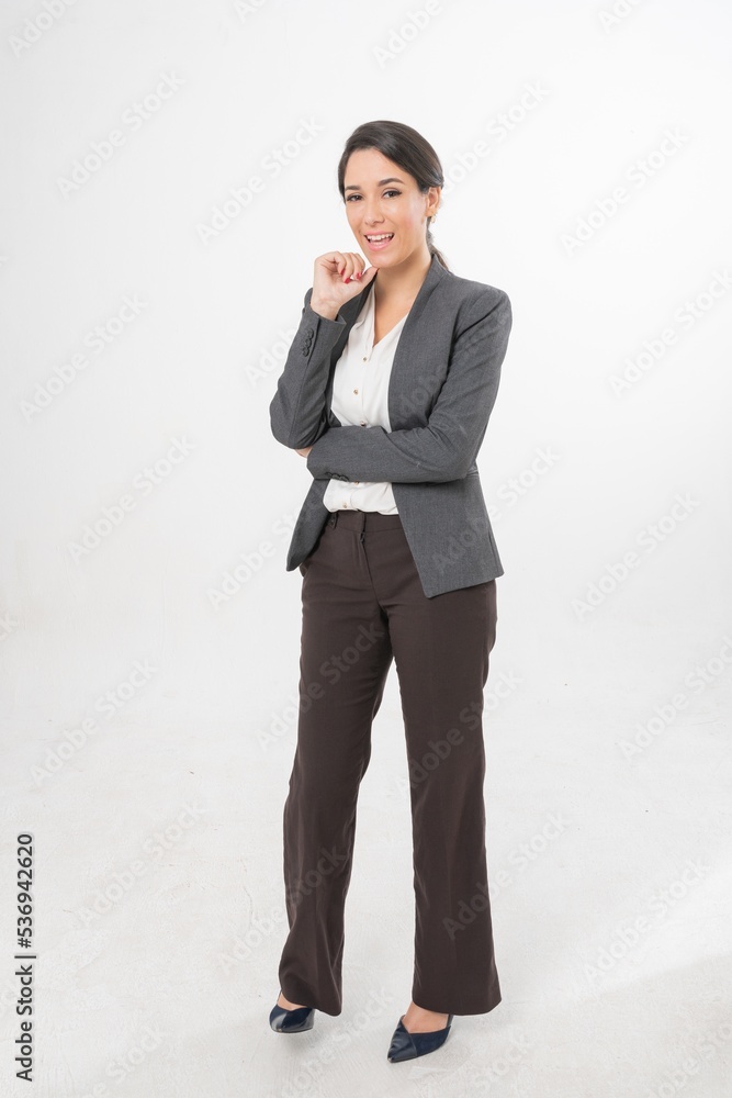Studio portrait photo of a young beautiful elegant Brazilian female businesswoman lady wearing smart casual business attire suit posing with a series moments of emotion and gesture for all application Studio portrait photo of a young beautiful elegant Brazilian female businesswoman lady wearing smart casual business attire suit posing with a series moments of emotion and gesture for all application