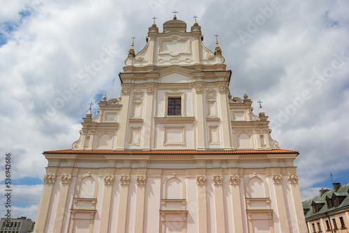 Facade of a famous church in historic city Zamosc, Poland
