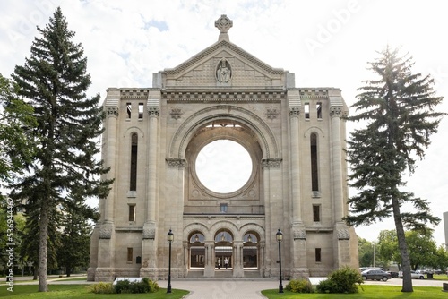 St. Boniface Cathedral with blue cloudy sky in the background Winnipeg, Manitoba, Canada photo