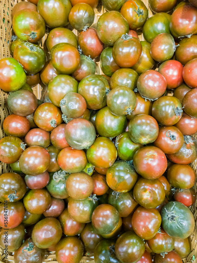 Vegetables in a supermarket. Tomatoes. Vegetables in a supermarket. Tomatoes.